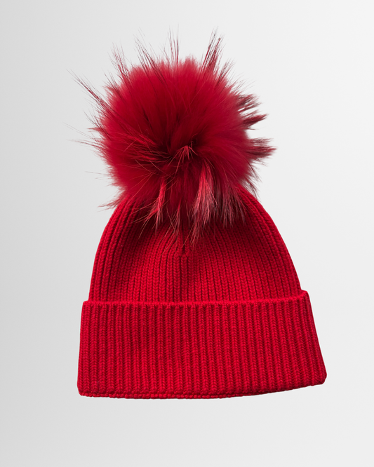 Berretto con pon-pon rosso